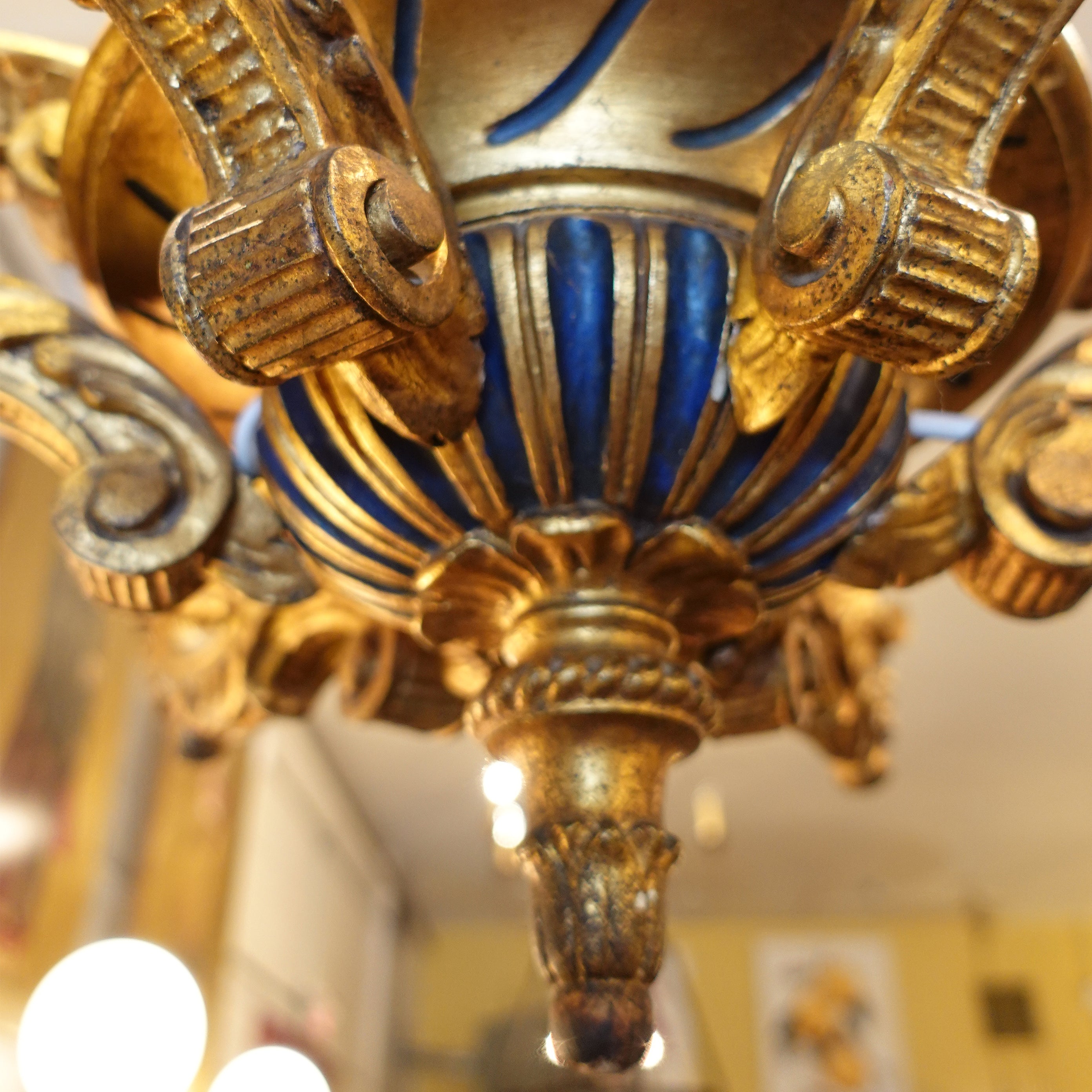 Close up detail of the bottom of a 19th-Century Hand-Carved Giltwood Chandelier