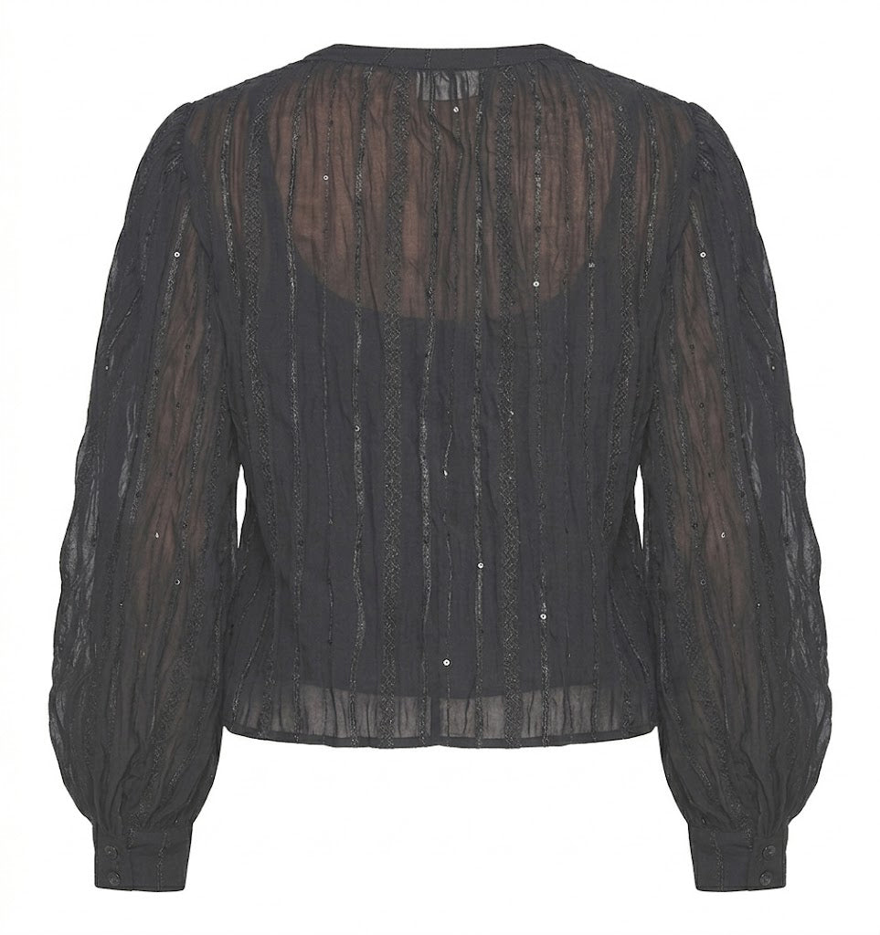 Slightly sheer blouse with vertical pinstripes of sequins and voluminous sleeves.