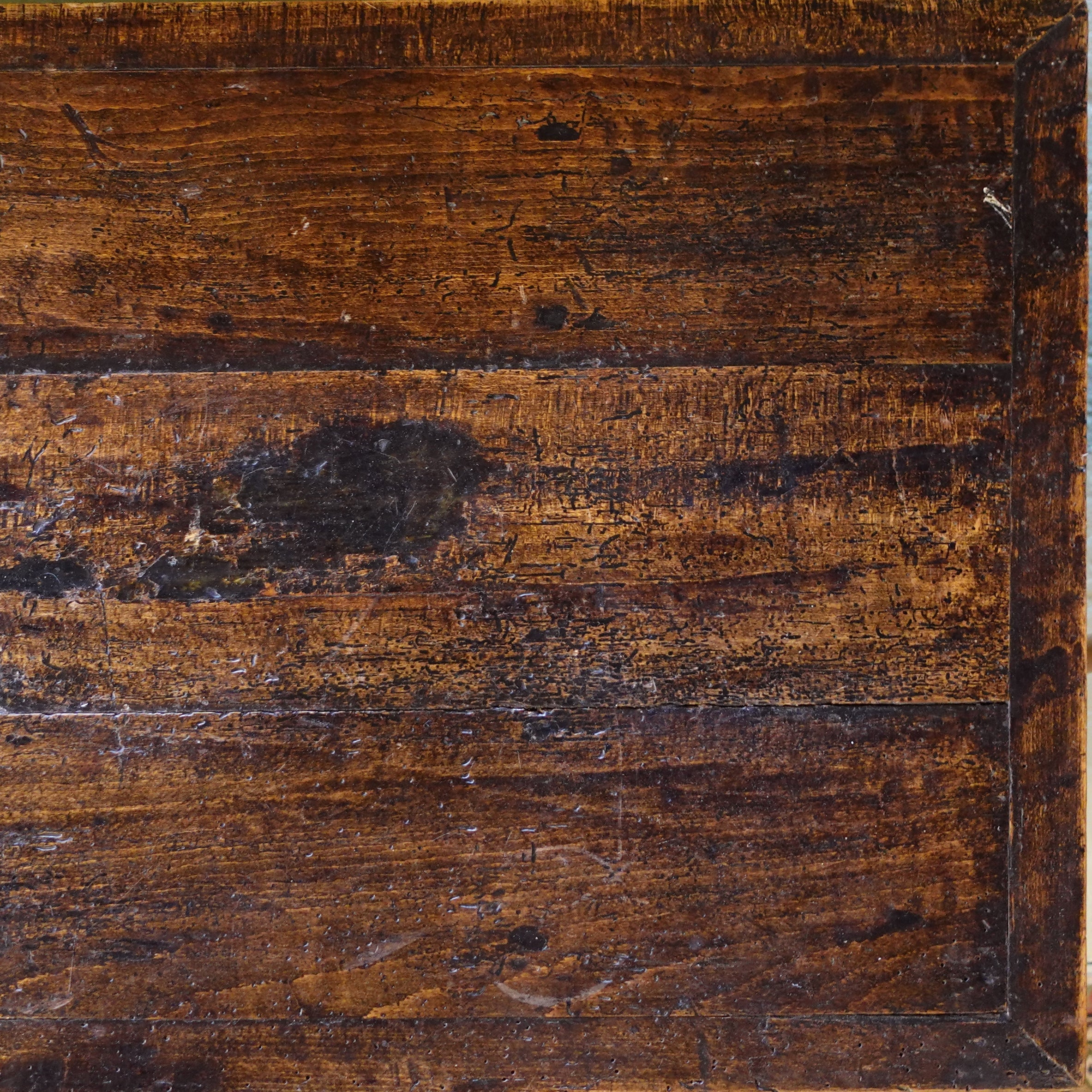 Detail of the sufrace of a Dark Stained Antique Belgian Farm Table circa 1800