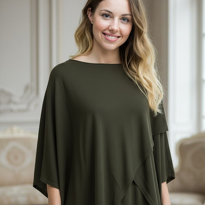Forest Green Cashmere and Wool Blend Cashmere Poncho worn by a French model in an elegant room
