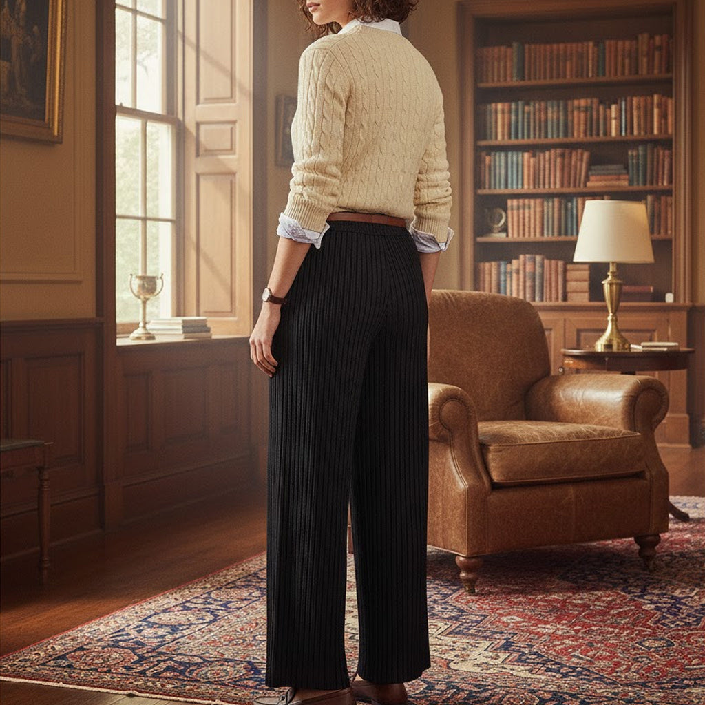 Back view of high-waisted pinstripe linen pants with a tailored fit, styled for a sophisticated literary aesthetic in a traditional heritage interior.