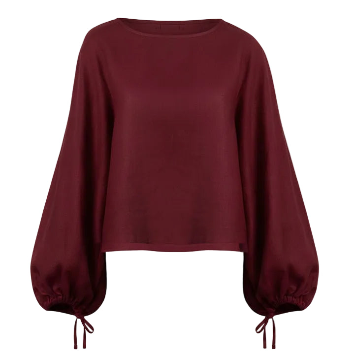 Bordeaux wine-colored puff sleeve cropped linen shirt featuring voluminous sleeves and adjustable wrist ties on a clean white background.