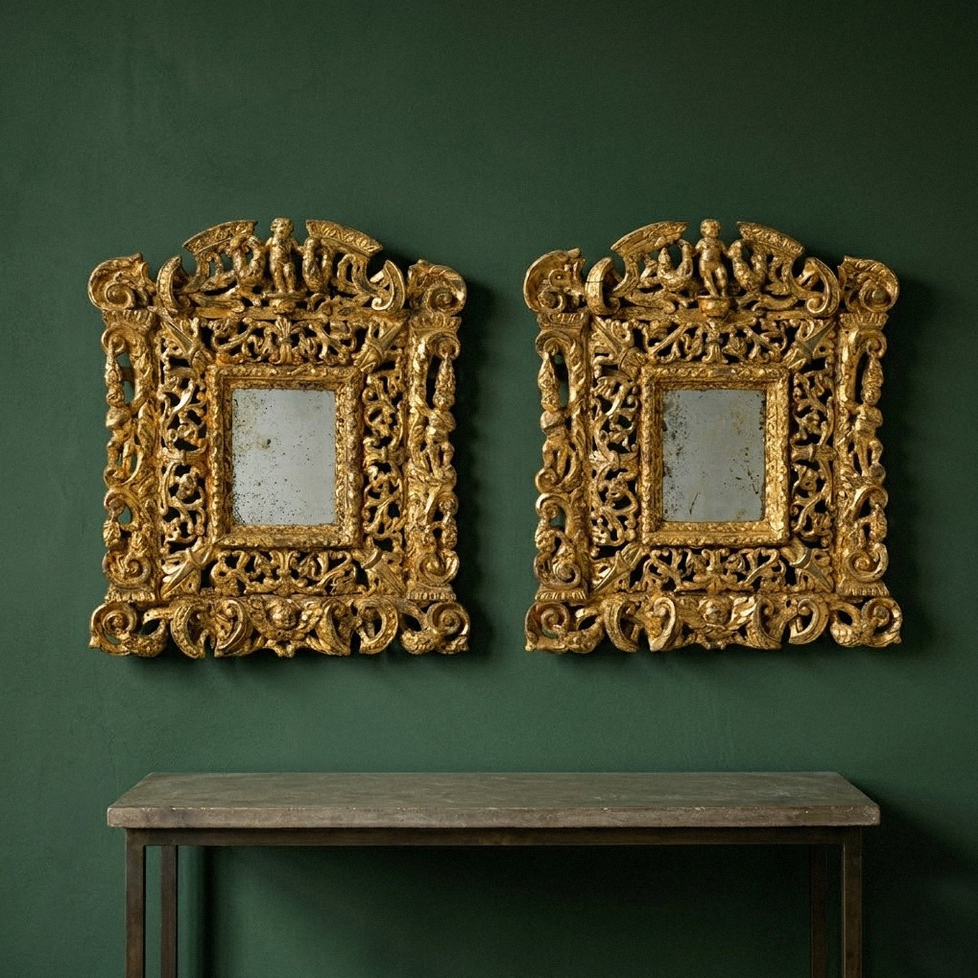Pair of Elaborately Carved 19th century Giltwood Mirrors