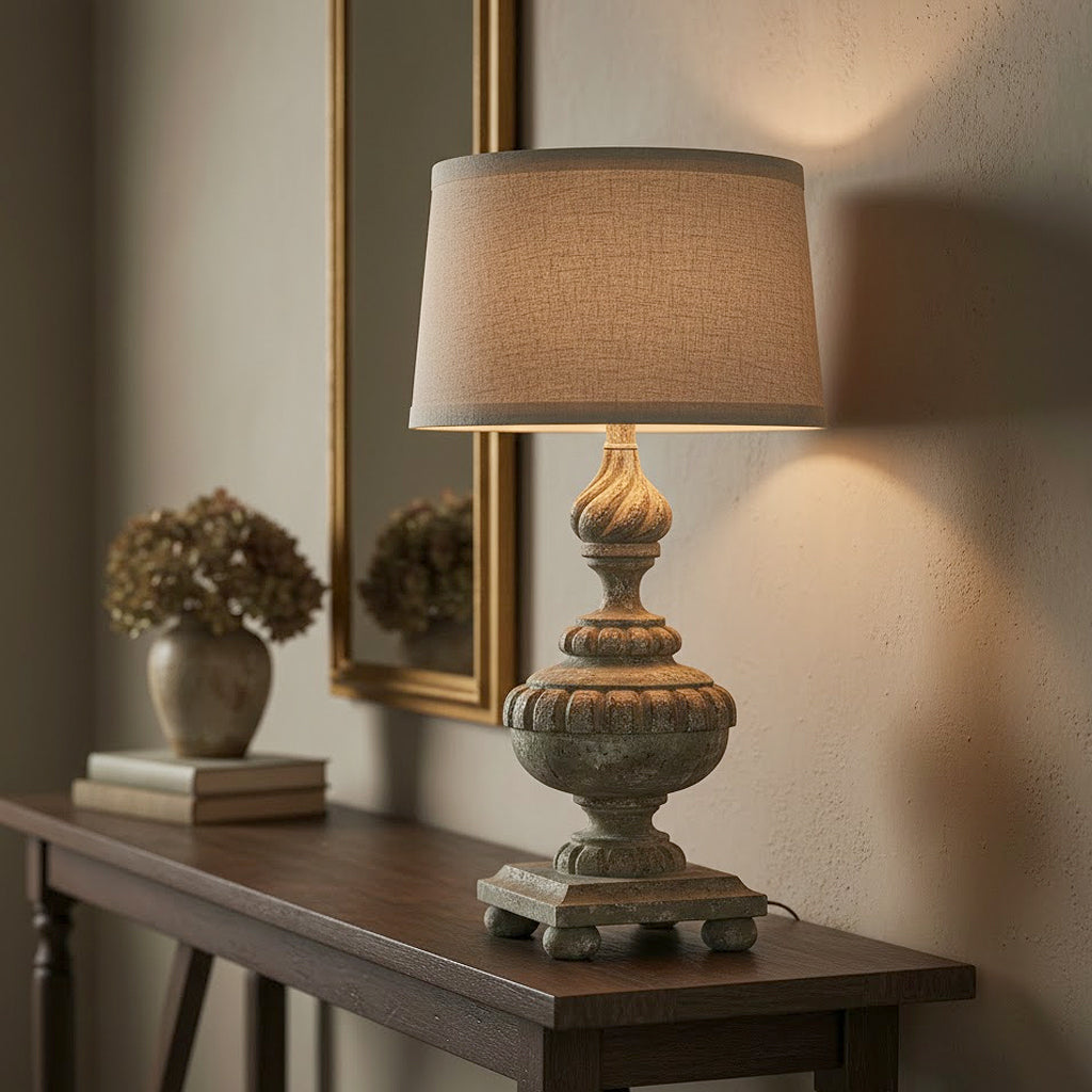 Provence Home Weathered Antique style Urn Table Lamp set on a walnut console table in a modern home.