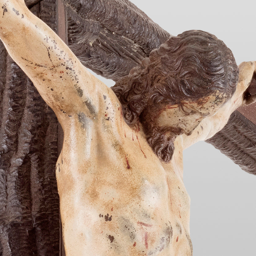 Rare bronze crucifix after a model by Michelangelo and painted by Francesco Pacheco