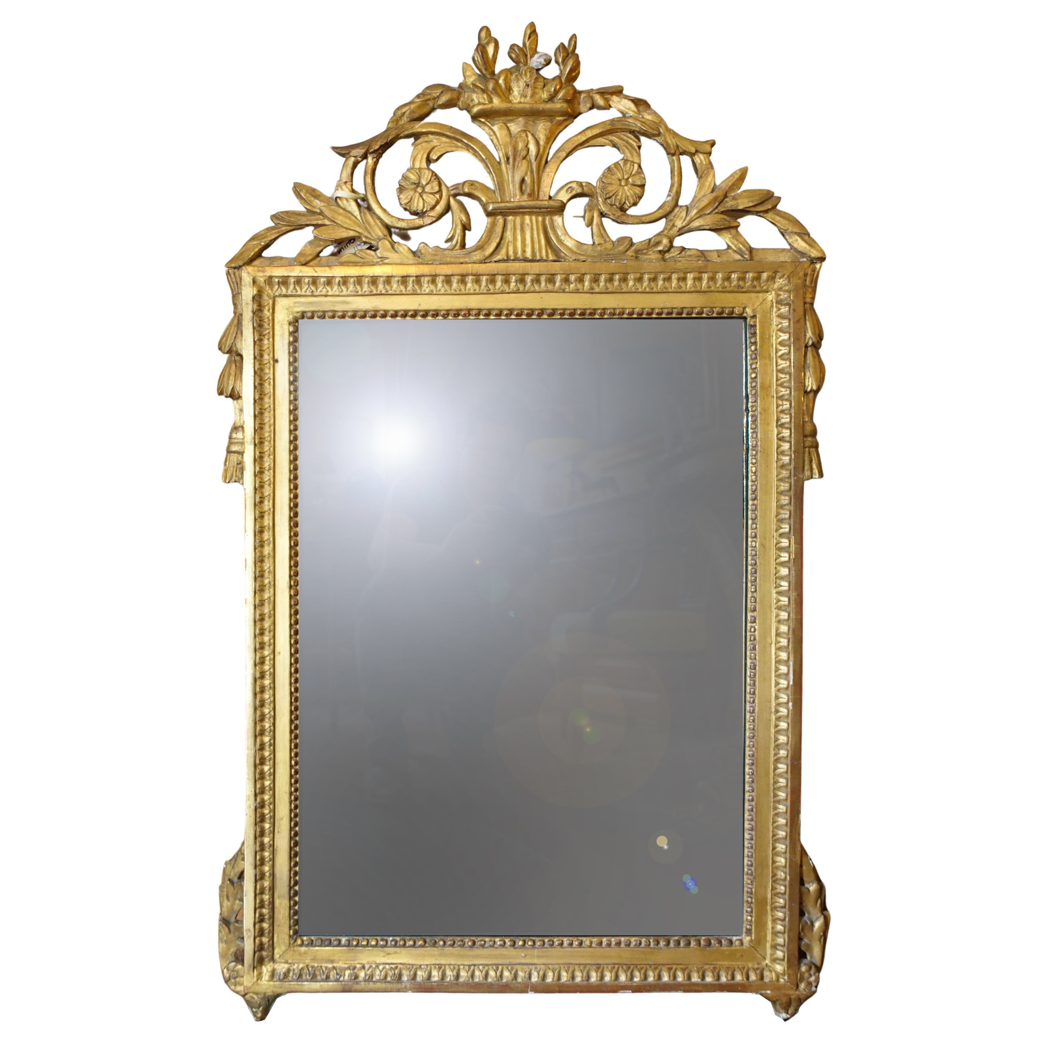 19th Century Swedish Giltwood Mirror with Neo-Classical floral carvings and aged patina