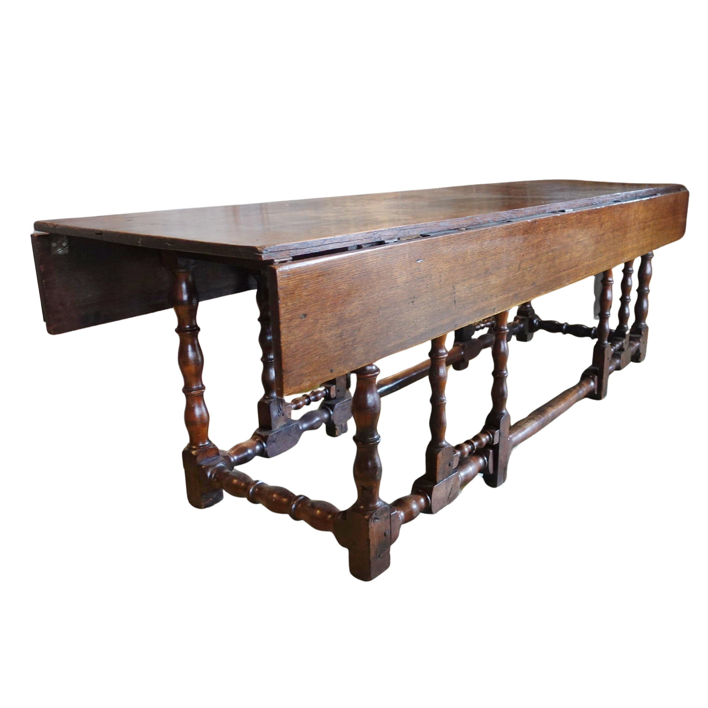 Antique early 1800s English oak drop-leaf gateleg table