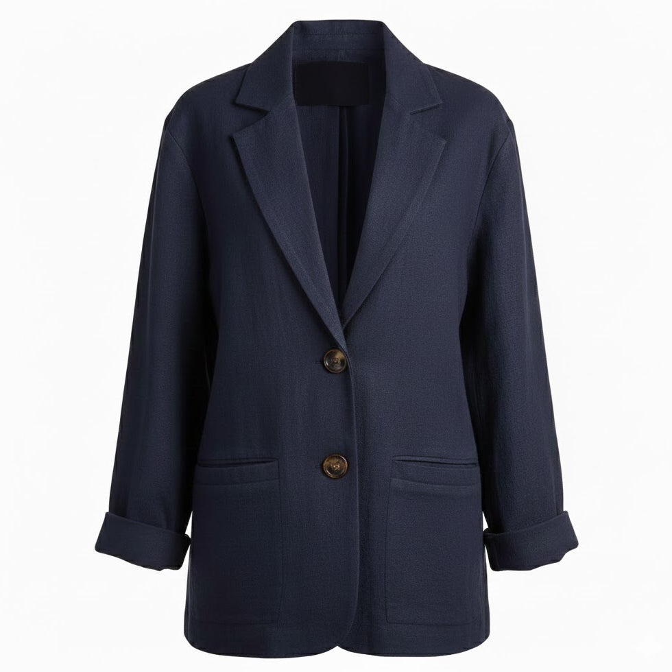 Handmade navy blue European linen blazer for women, featuring a loose-fitted silhouette, classic notched lapels, and sustainable Oeko-Tex certified fabric for a timeless heritage wardrobe.