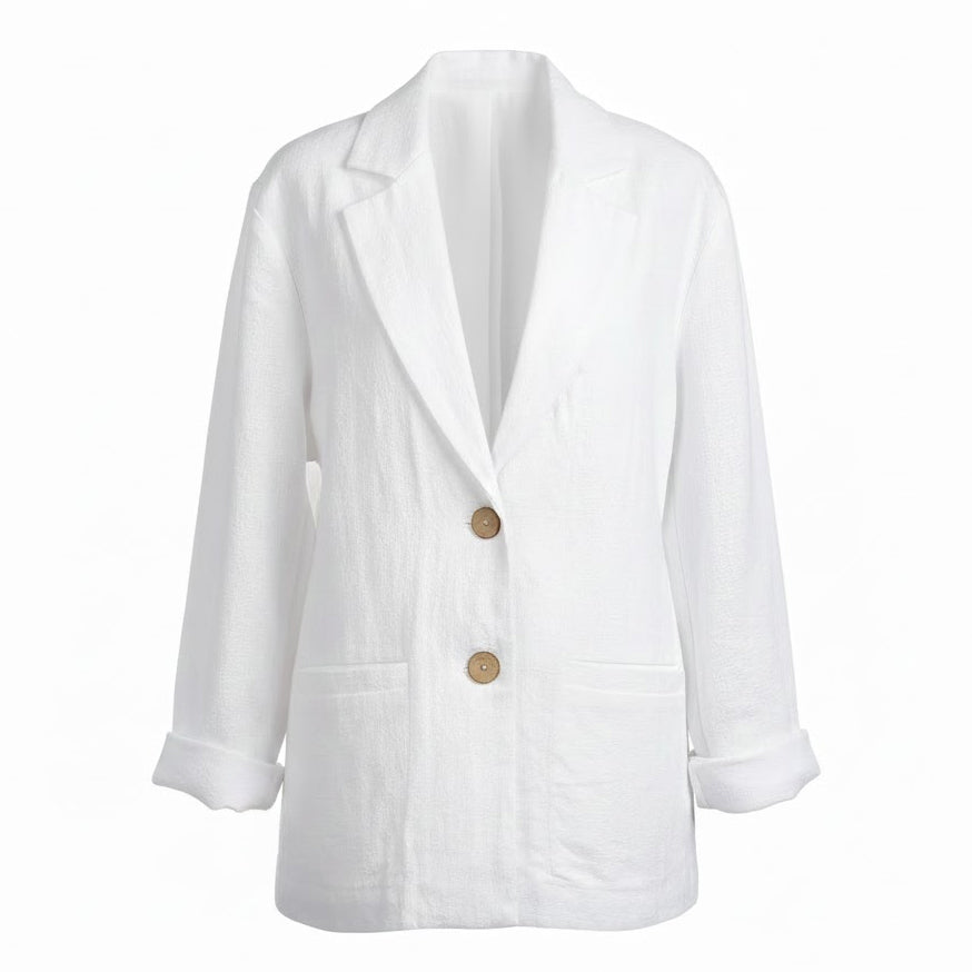 Handmade white European linen blazer for women featuring a loose tailored fit, functional side pockets, and sustainable wooden buttons.
