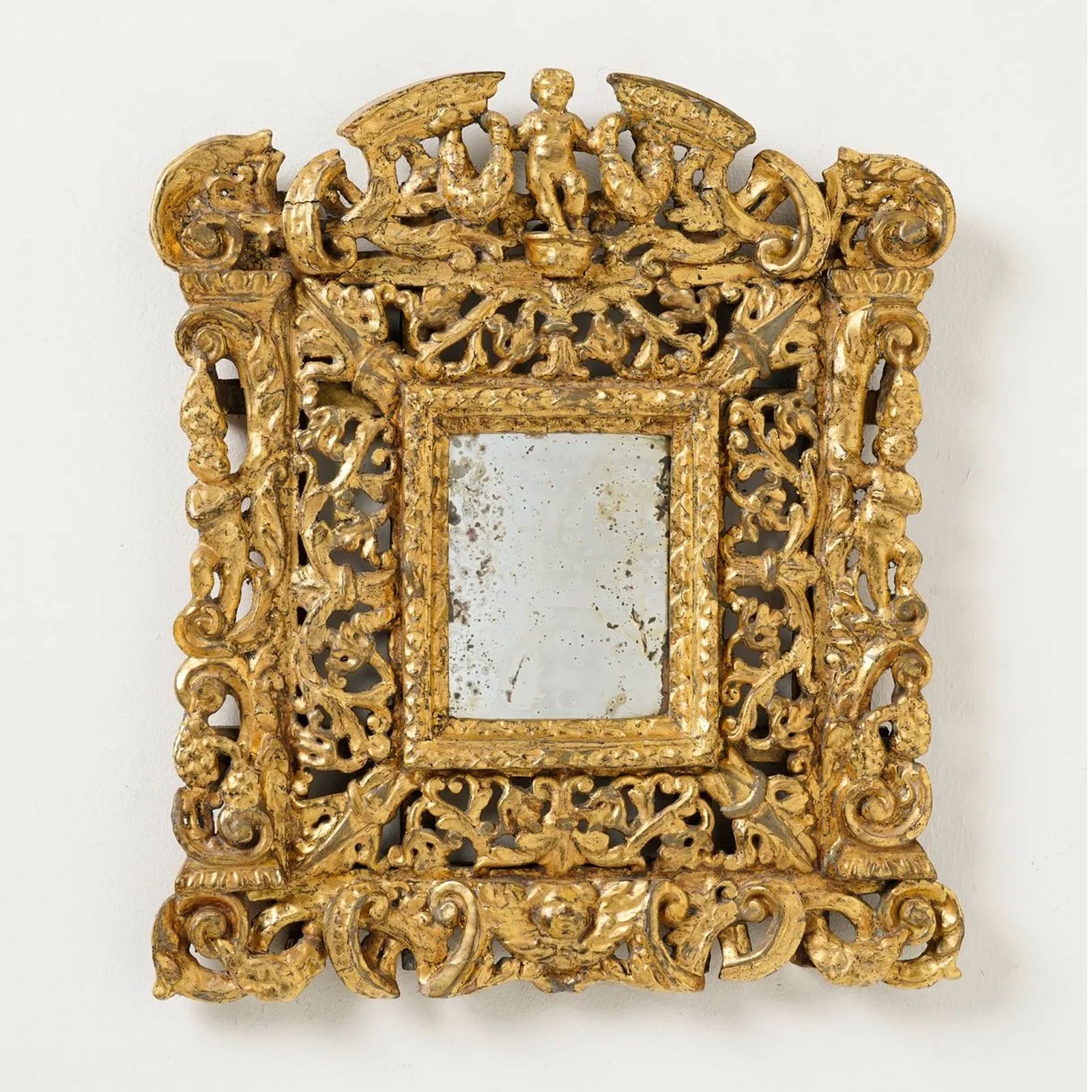 Pair of Elaborately Carved 19th century Giltwood Mirrors