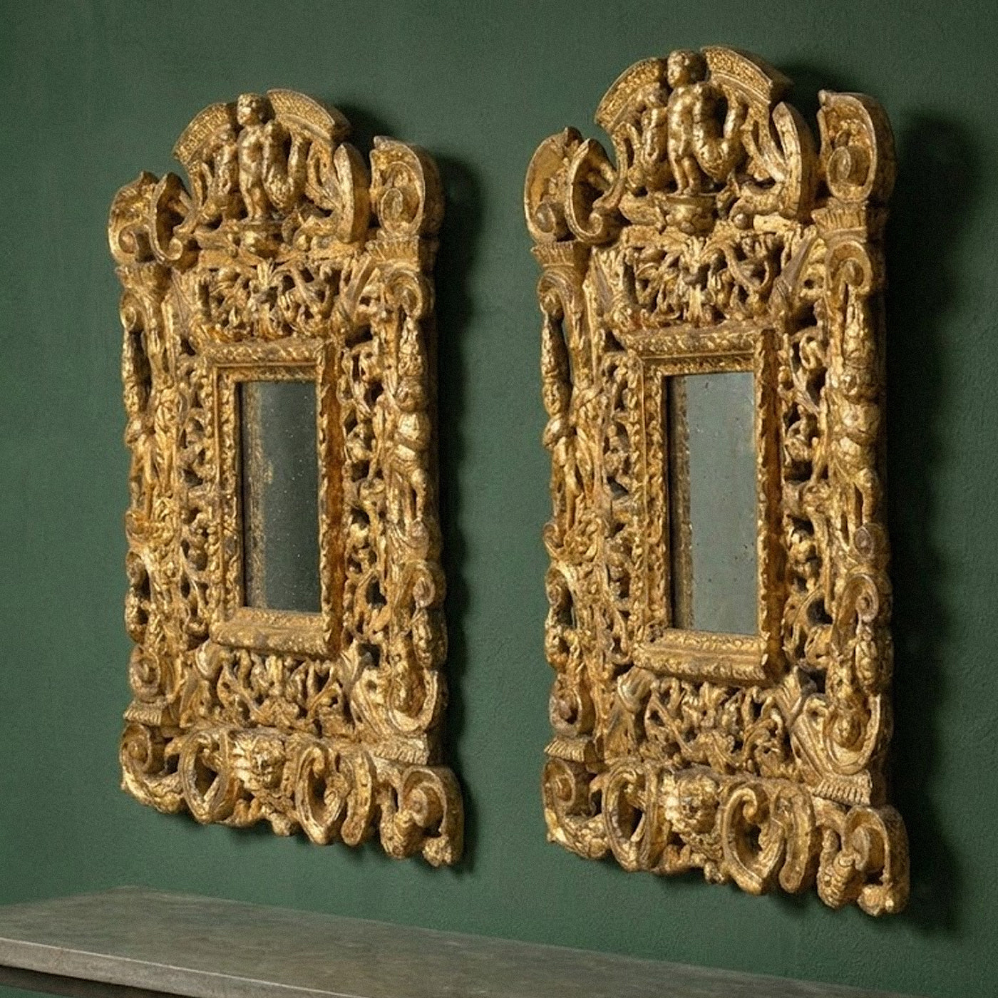Pair of Elaborately Carved 19th century Giltwood Mirrors