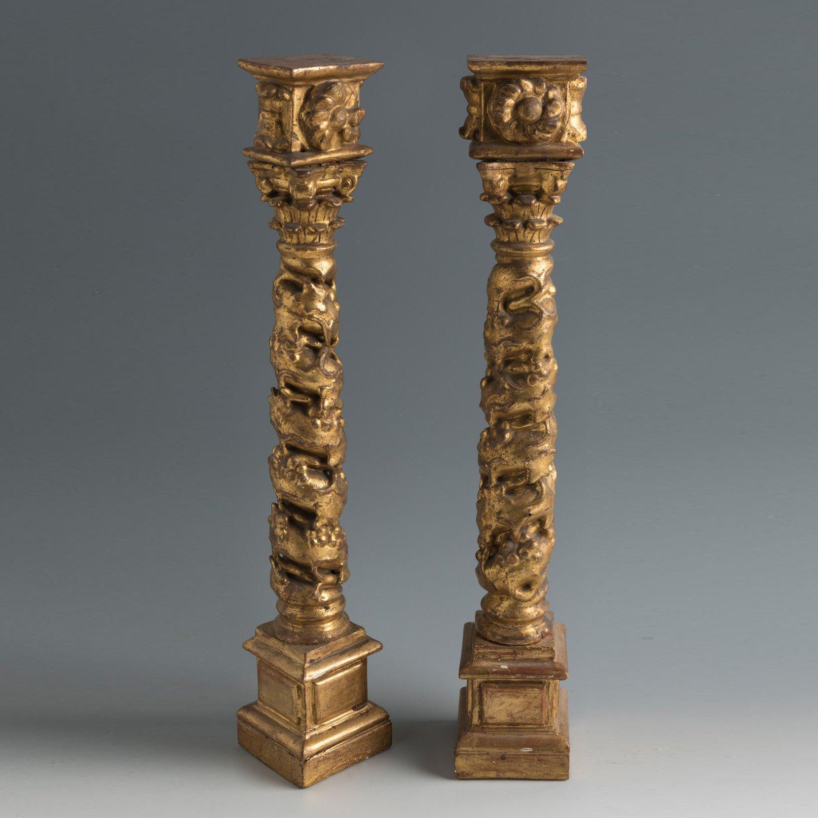 Pair of Spanish giltwood Baroque Solomonic antique columns