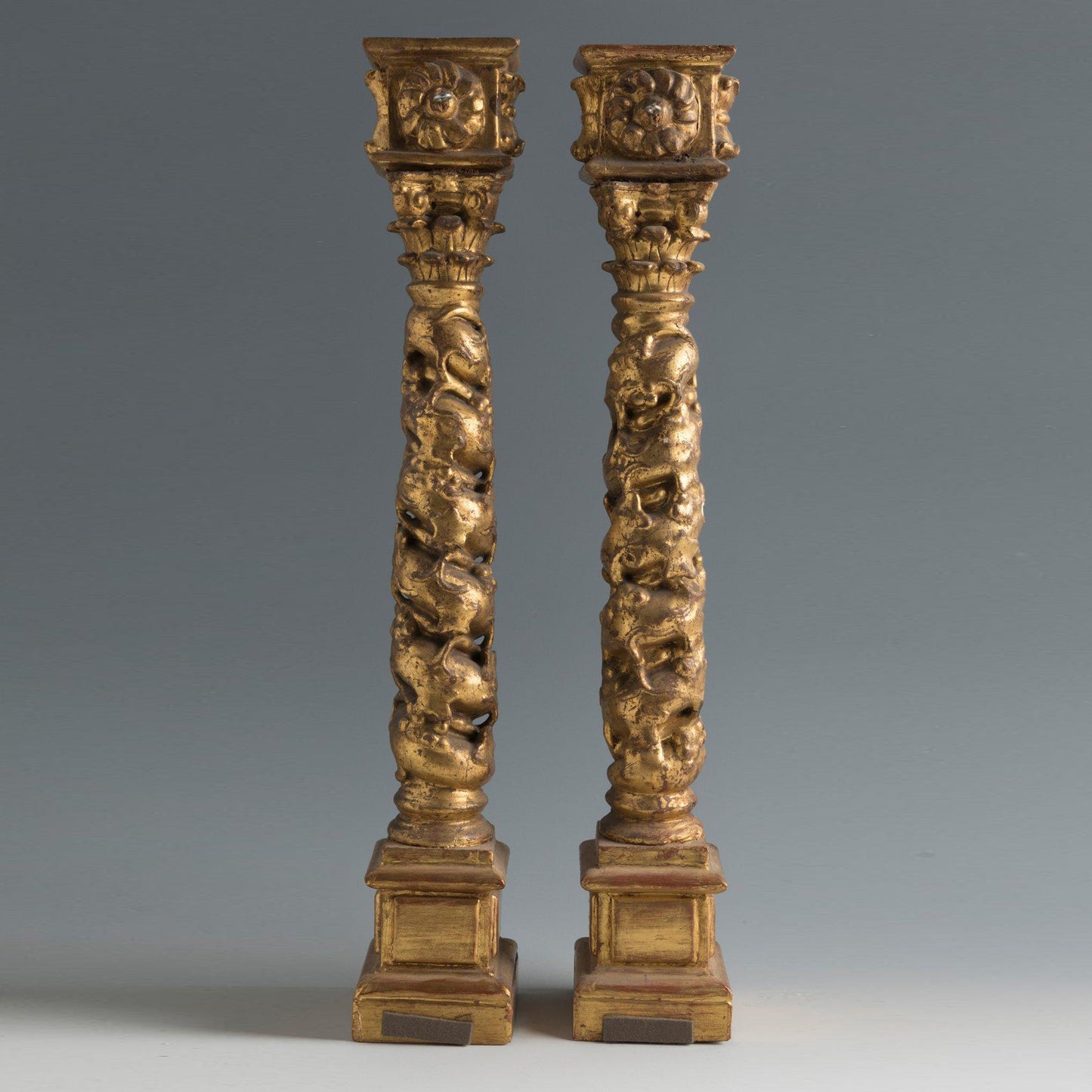 Pair of Spanish giltwood Baroque Solomonic antique columns