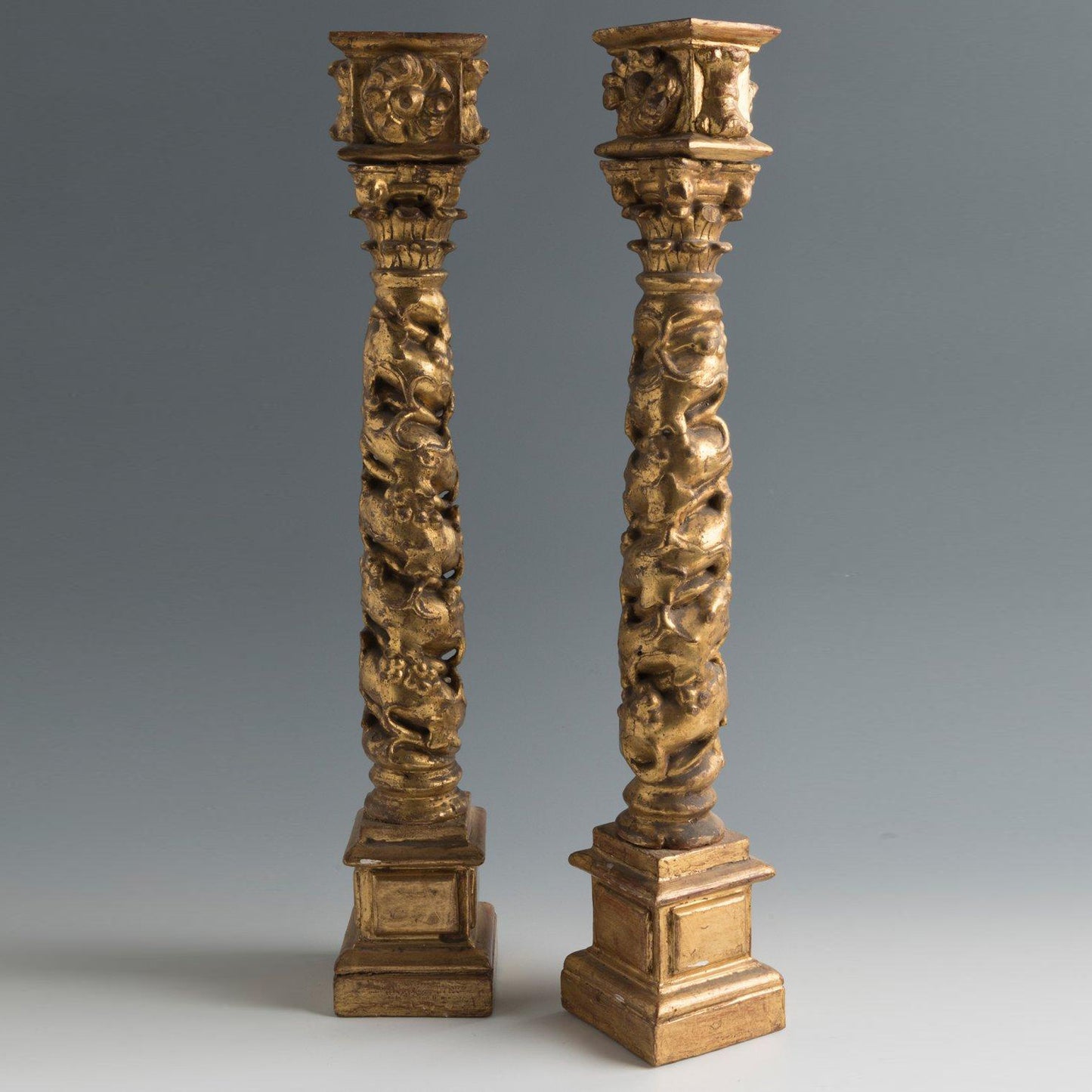 Pair of Spanish giltwood Baroque Solomonic antique columns