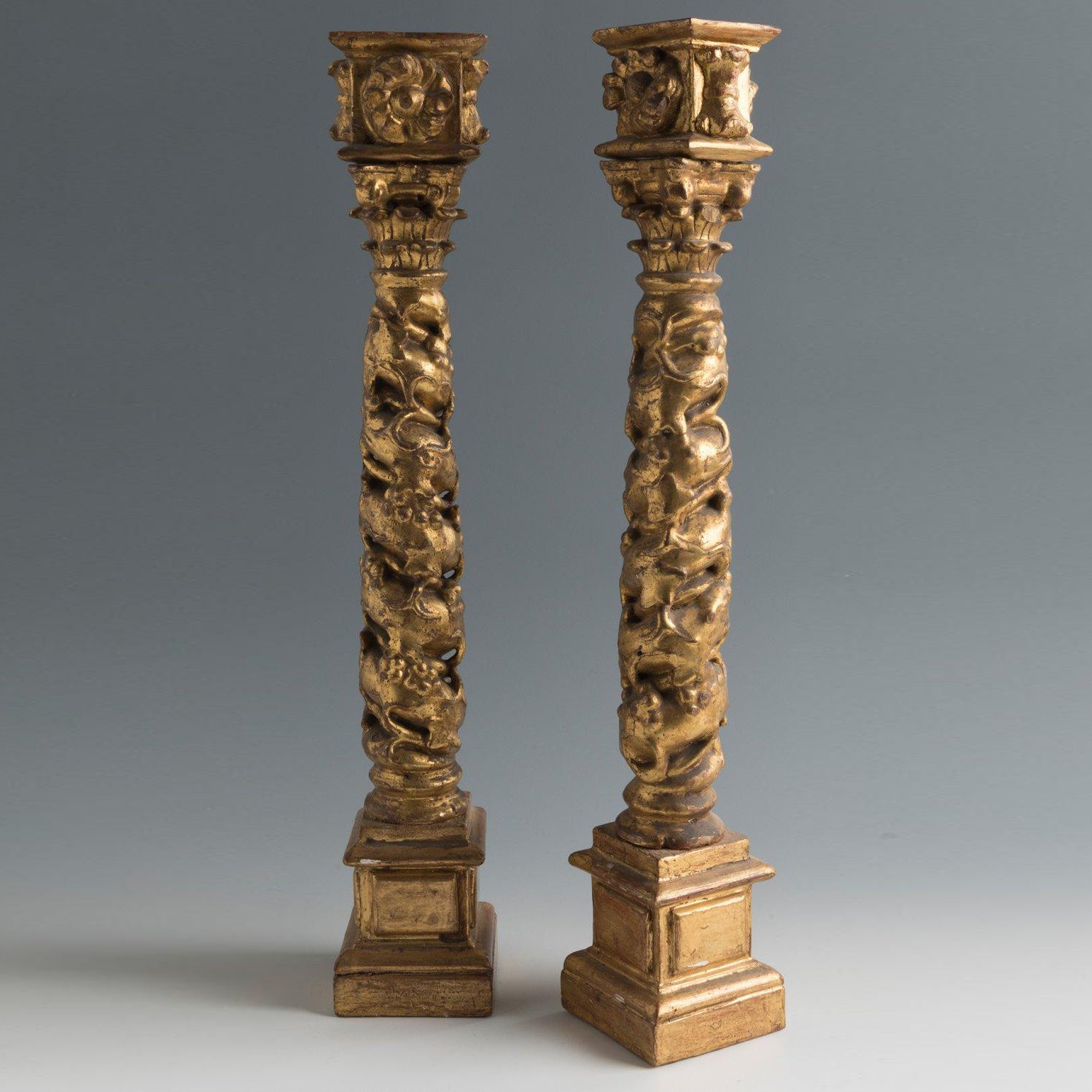 Pair of Spanish giltwood Baroque Solomonic antique columns