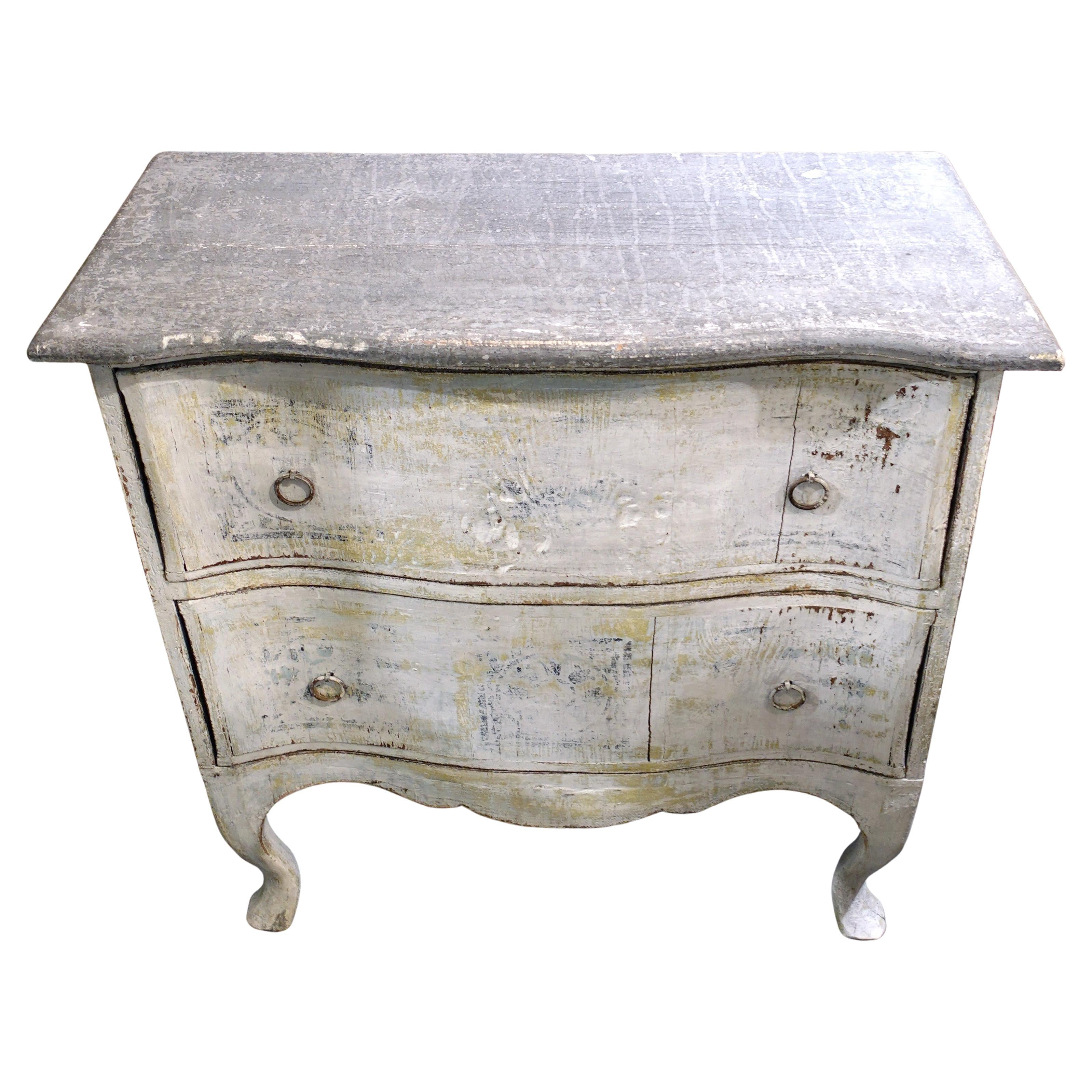 Faux stone painted top of 18th century Italian commode showing historical pigment layers