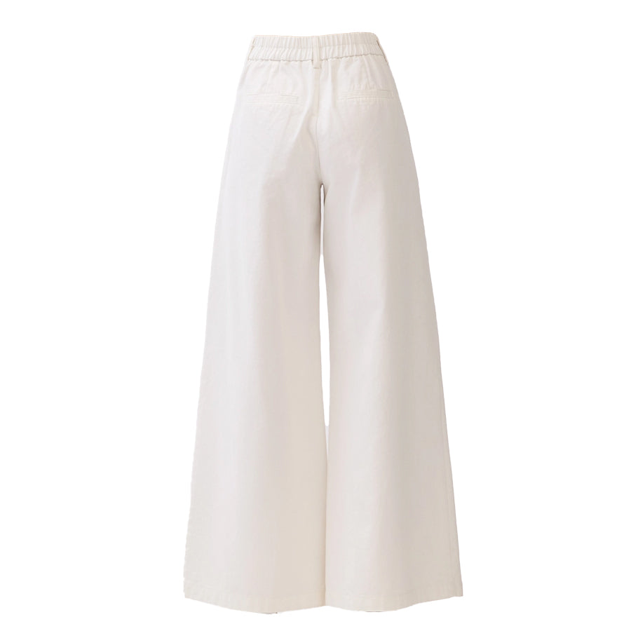 Back view of white cotton twill trousers featuring a comfortable elasticized rear waistband and tailored welt pockets for a refined yet wearable heritage design.